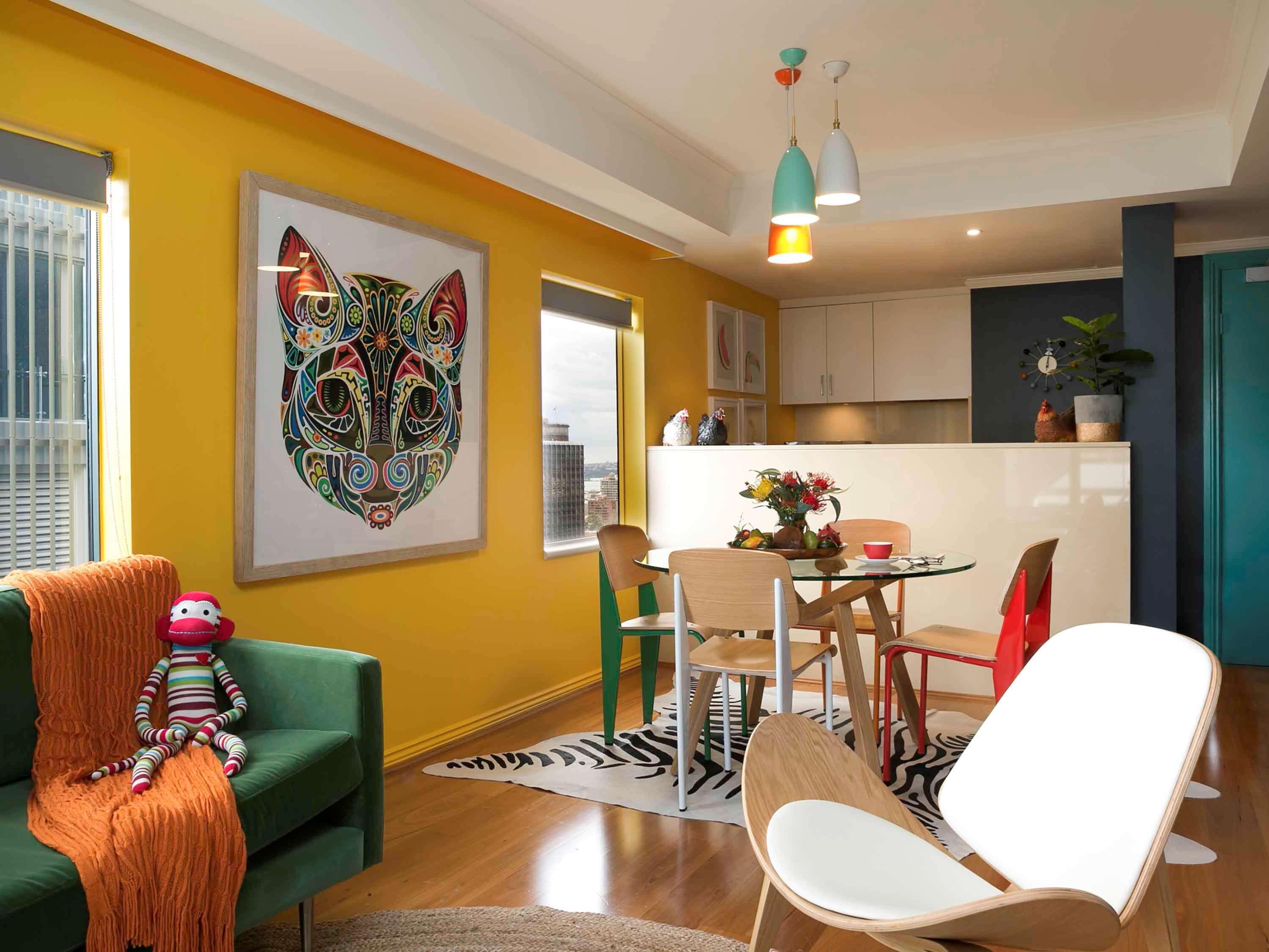 Pullman Sydney Hyde Park Hotel Exterior foto A living room with a kitchen in the background