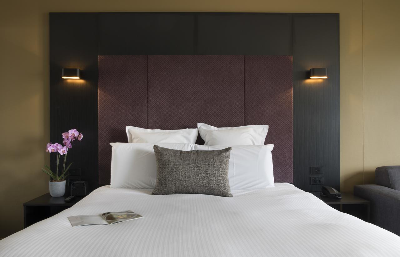 Pullman Sydney Hyde Park Hotel Exterior foto A bedroom at the hotel